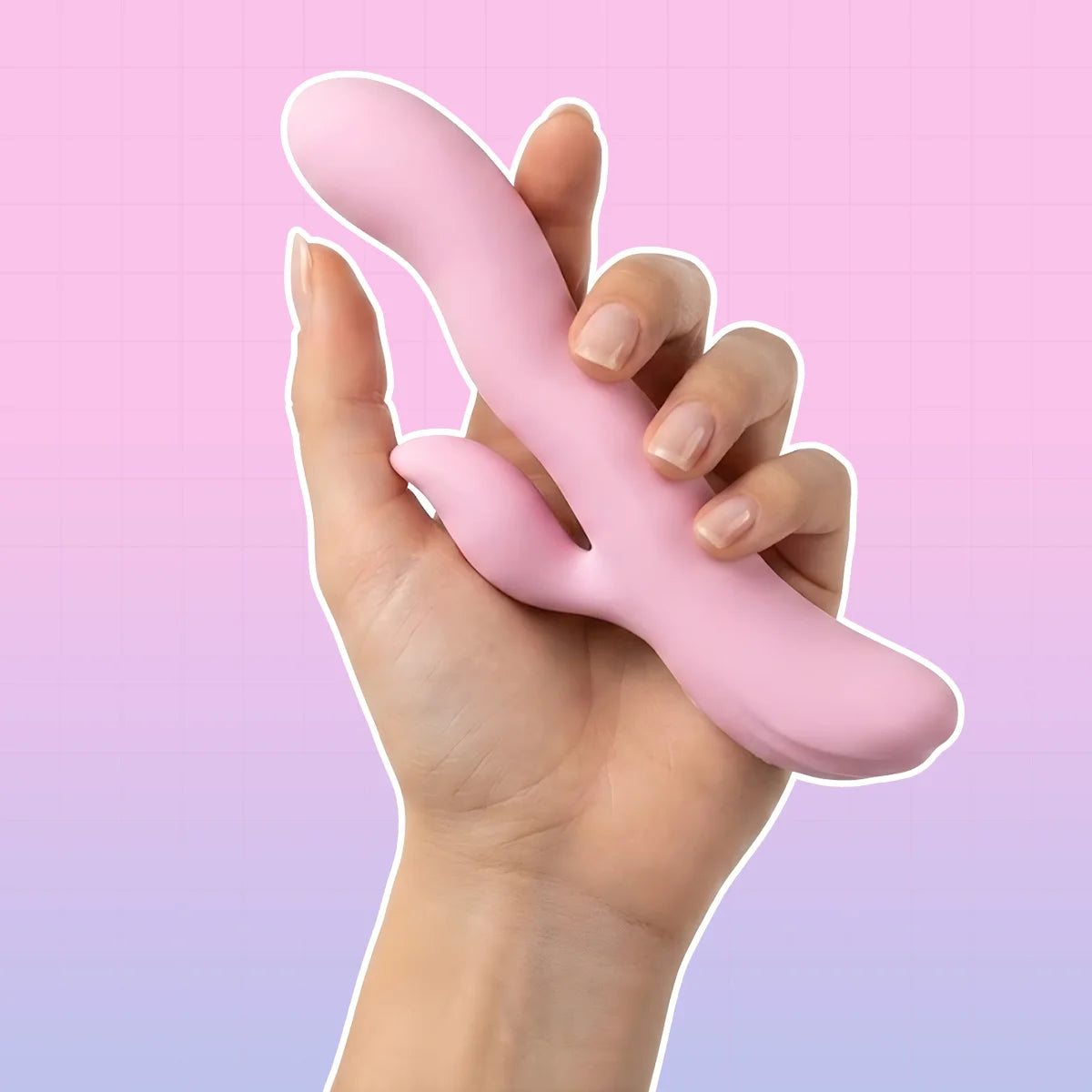 A hand holding a light pink silicone personal massager with a curved shaft and dual bulb ends, set against a pink-to-purple gradient background with a faint grid pattern.
