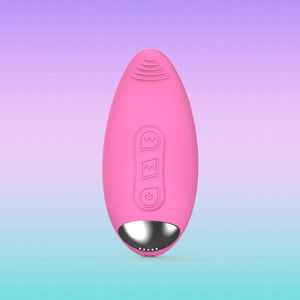 A pink personal massager with a metallic silver base, shown against a purple-to-blue gradient background with a subtle grid pattern.