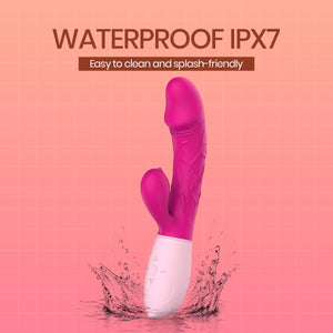 A pink and white waterproof IPX7 personal massager shown standing in water with a splash, on a pink background with text reading 'WATERPROOF IPX7' and 'Easy to clean and splash-friendly'.