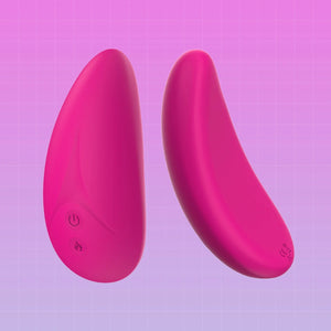 Two curved, egg-shaped personal massagers in a vibrant hot pink color, shown from opposite angles against a purple grid background.